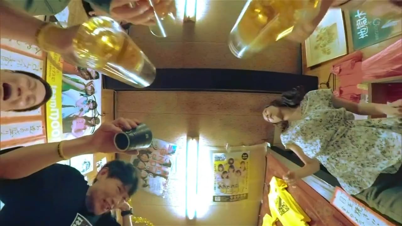 gopro footage of ai and friends drinking at a table