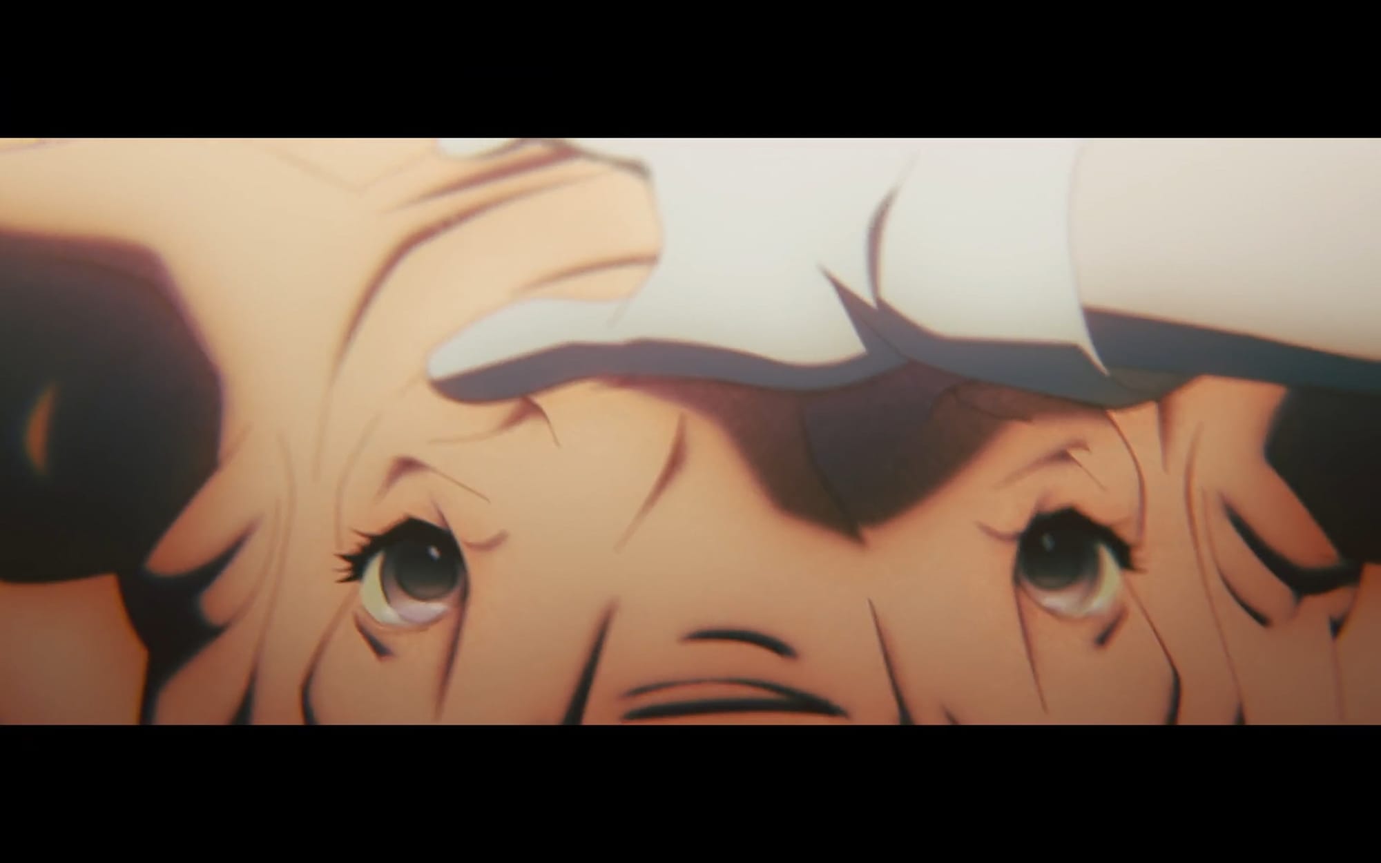 a hand rests on the head of a pig.