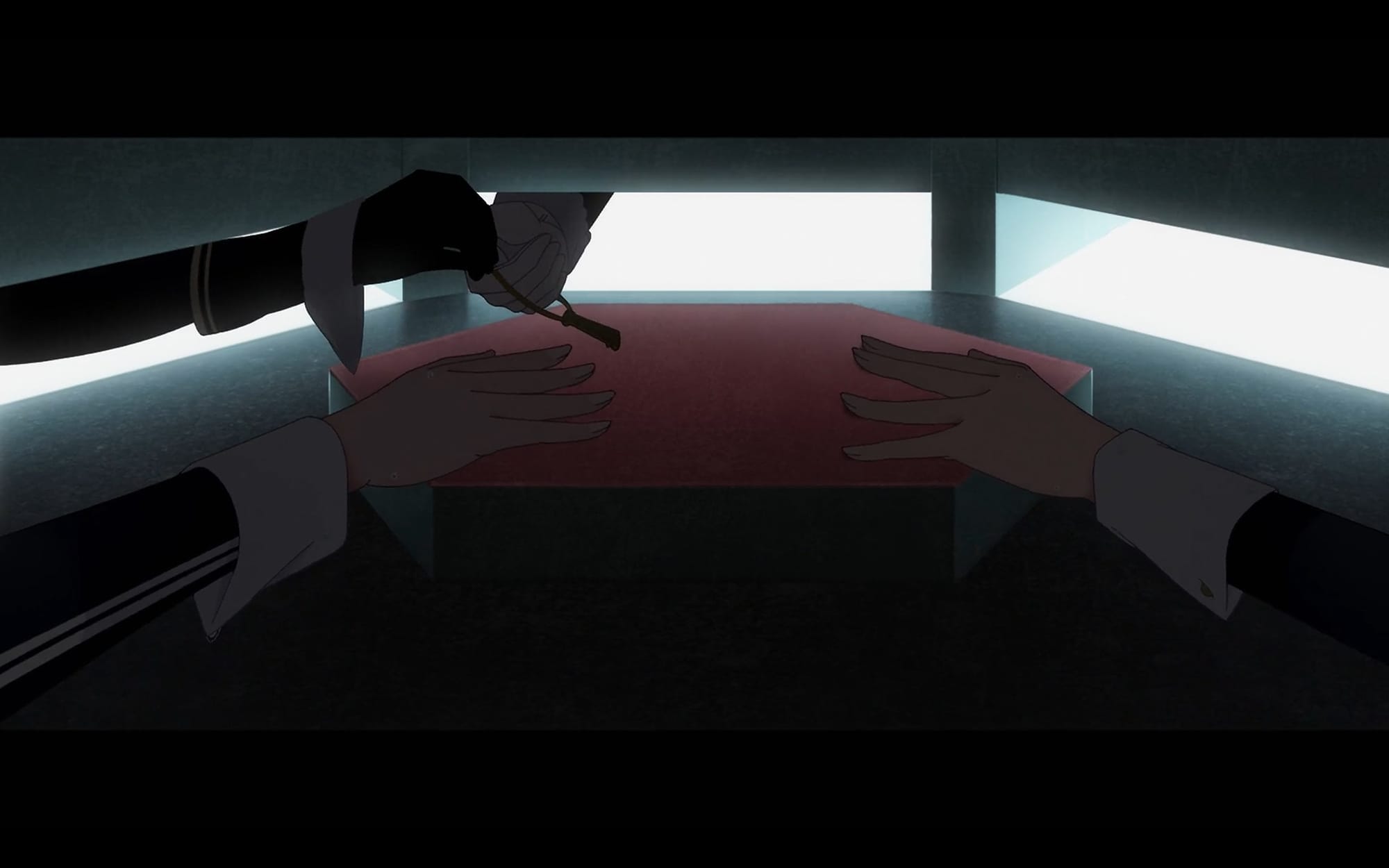 Four hands reach for a key.